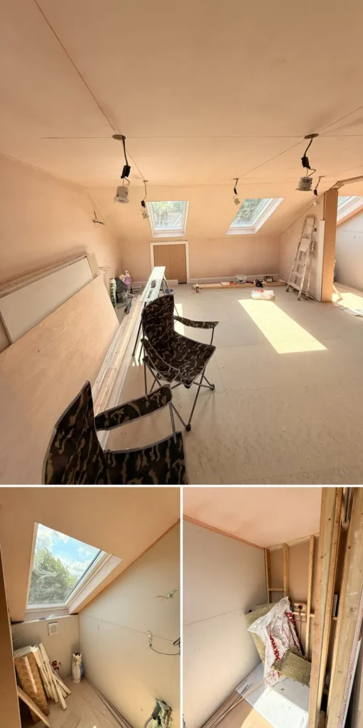 Loft conversion during construction: bare walls, skylights and stud walls for the new shower room