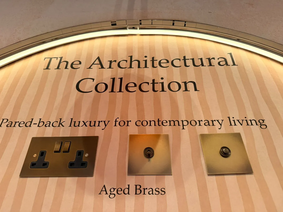 Aged brass double socket, toggle switch and push button from The Soho Lighting Company's Architectural Collection at Decorex 2026